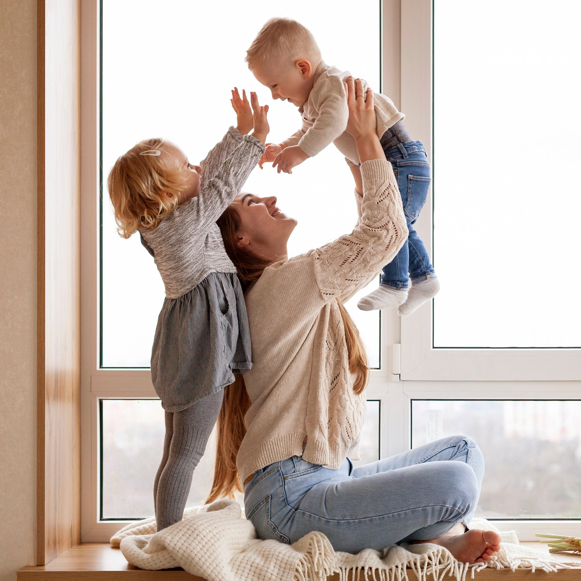 mother playing with childrens 1